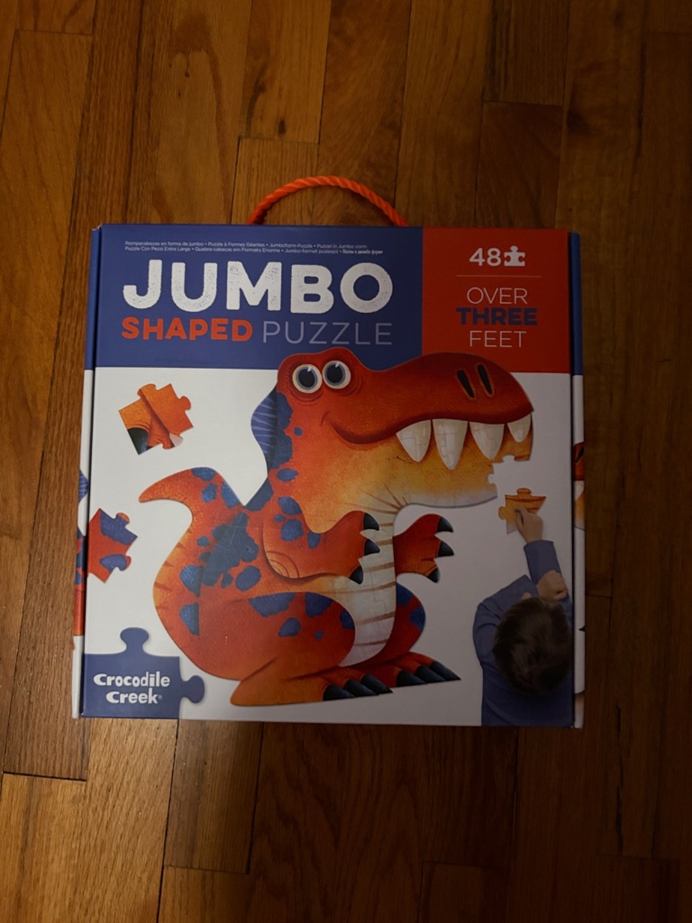 Crocodile Creek Jumbo Shaped Dinosaur Puzzle - Orange & Blue
